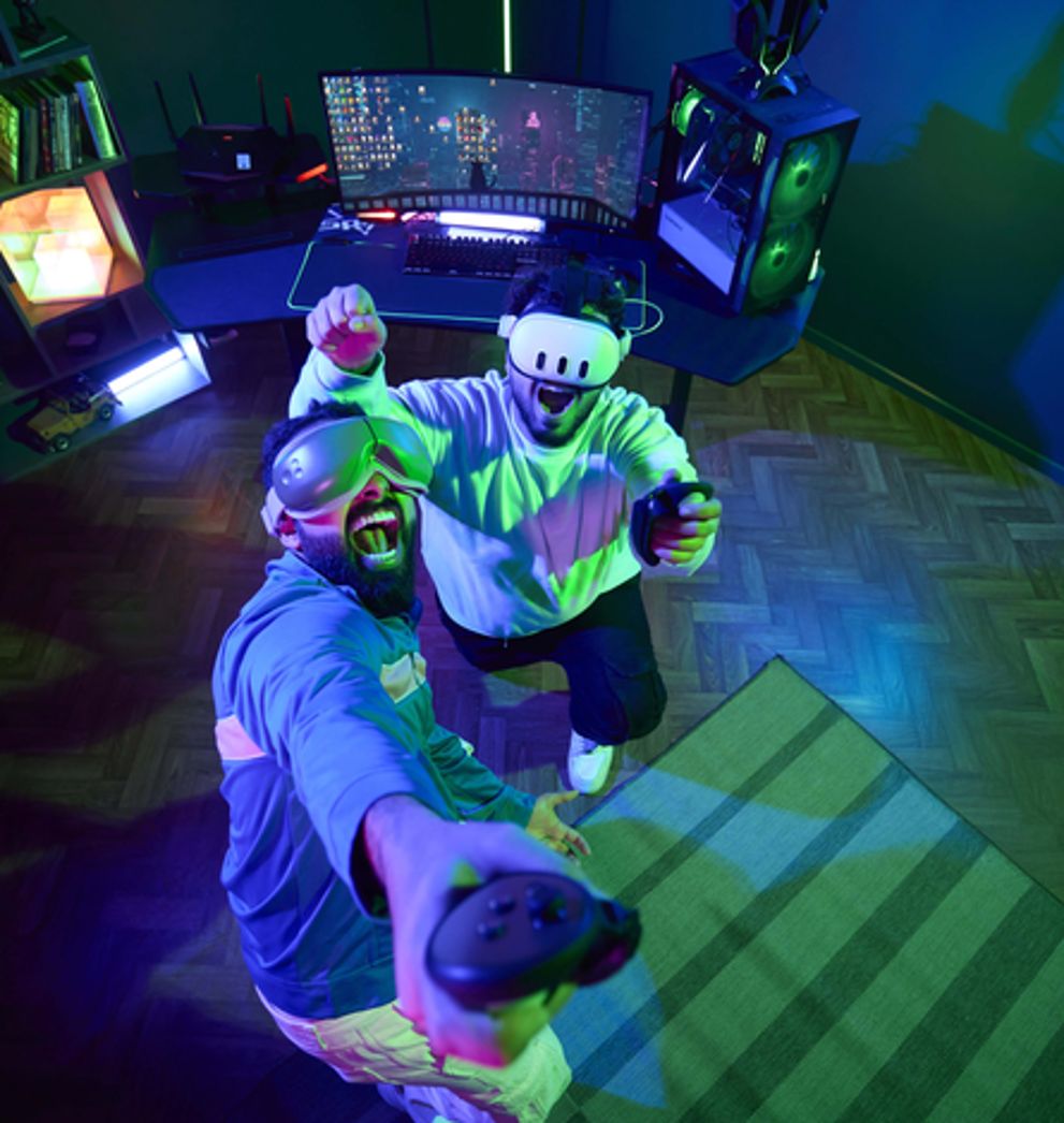 Two Friends enjoying VR gaming at home on Salam fibre unlimited home internet in Saudi Arabia